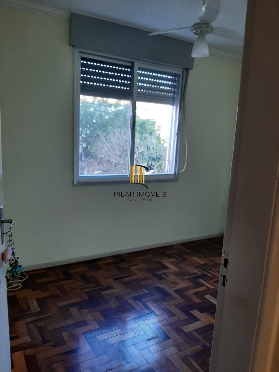 Apartamento de 3 quartos e vaga de garagem rotativa no Bairro Cristal em Porto Alegre/RS