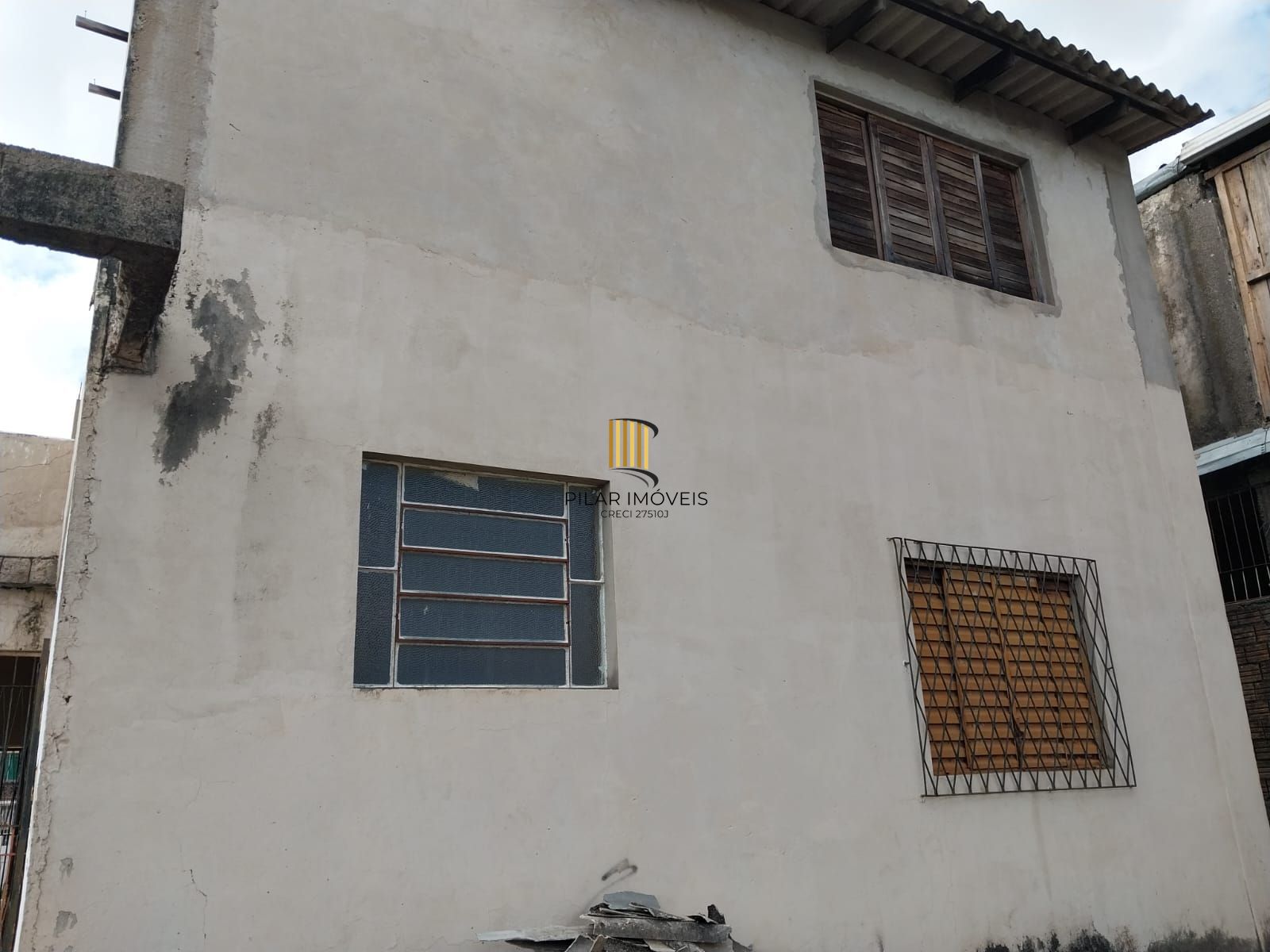 Terreno com prédio, Oportunidade excelente para construir Edifício