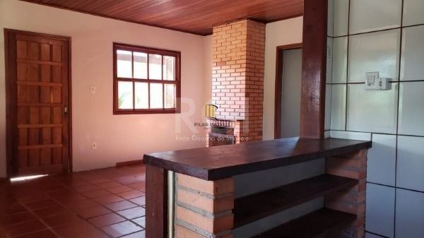 Casa em Porto Alegre, no bairro Hípica, com 2 dormitório(s), e 2 banheiros, à venda.