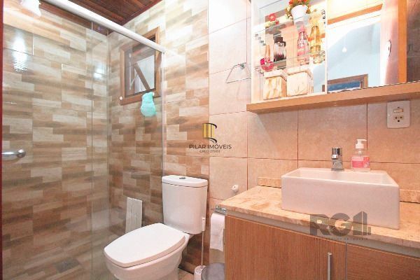 Casa em Porto Alegre, no bairro Hípica, com 3 dormitório(s), e 2 banheiros, à venda.
