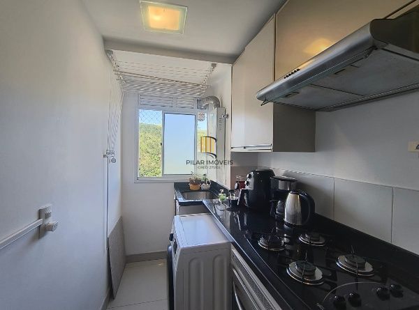 Apartamento de 2 quartos, suíte e 1 vaga de garagem no bairro Jardim Carvalho
