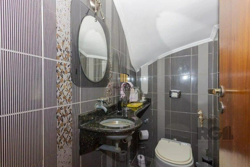 Casa 4 dormitórios no bairro Passo da Areia