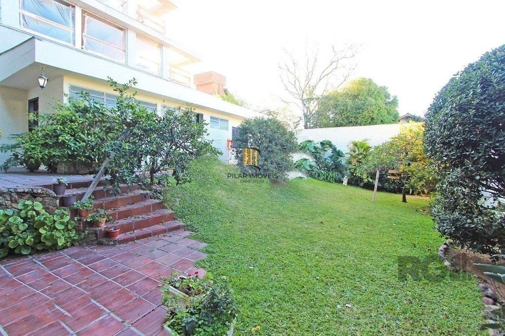 Casa 4 dormitórios no bairro Três Figueiras