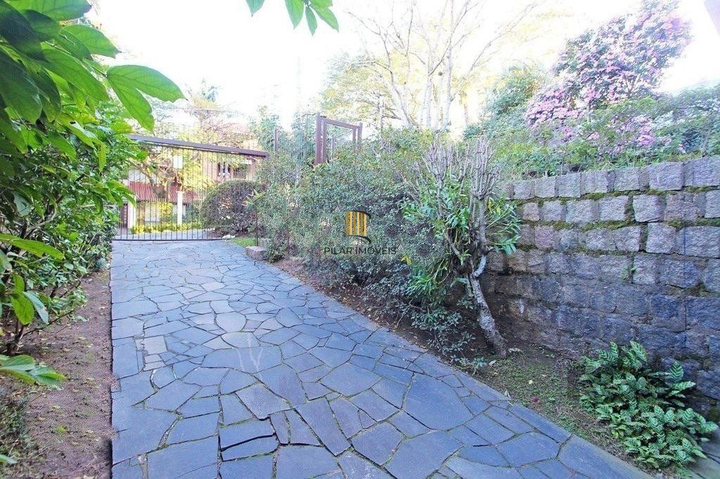 Casa 4 dormitórios no bairro Três Figueiras