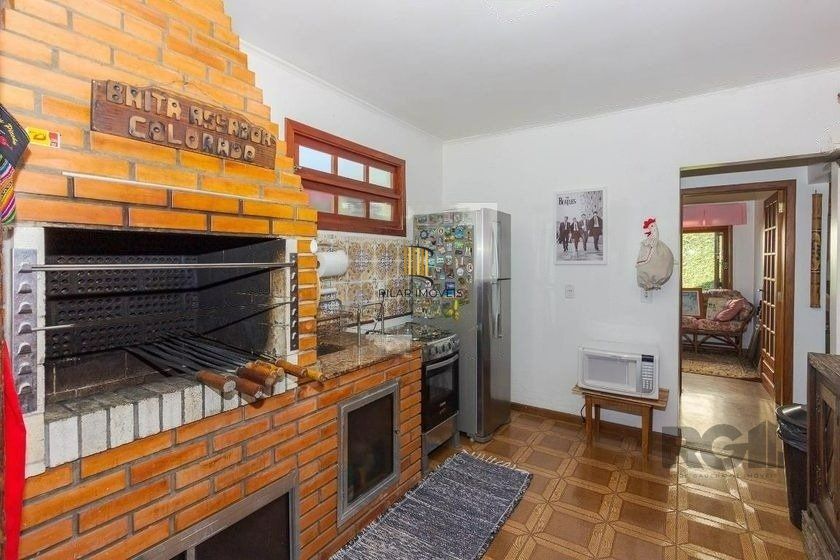 Casa 4 dormitórios no bairro Passo da Areia