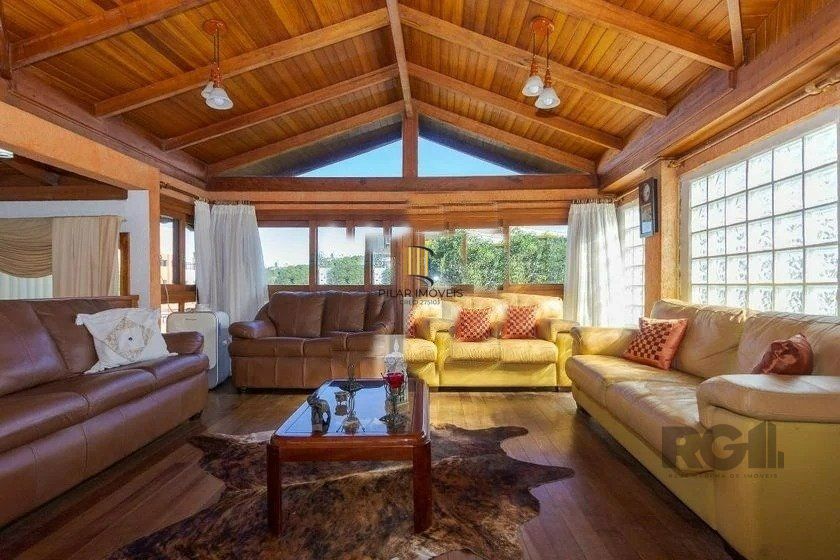 Casa 4 dormitórios no bairro Passo da Areia - Pilar Imóveis