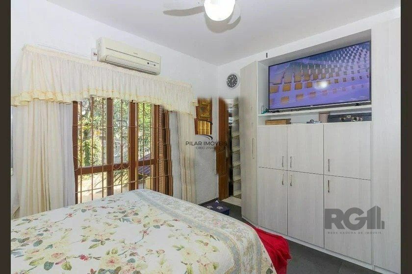 Casa 4 dormitórios no bairro Passo da Areia