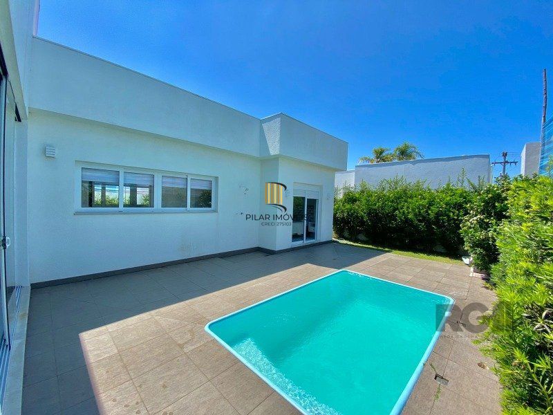 Casa de Condomínio 3 dormitórios no bairro Dubai