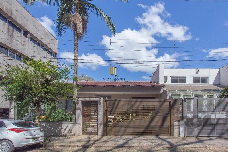 Casa 4 dormitórios no bairro Auxiliadora - Pilar Imóveis