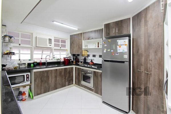 Casa Condominio para Venda - 201m², 3 dormitórios, sendo 1 suites, 2 vagas - Tristeza