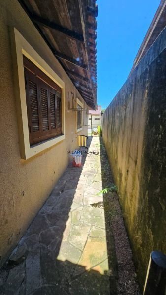 Casa 3 dormitórios no bairro Camaquã