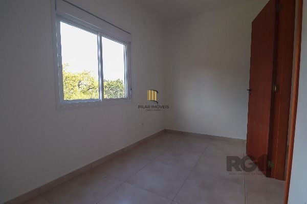 Casa Condominio em Porto Alegre, no bairro Vila Nova, com 2 dormitório(s), e 2 banheiros, à venda.
