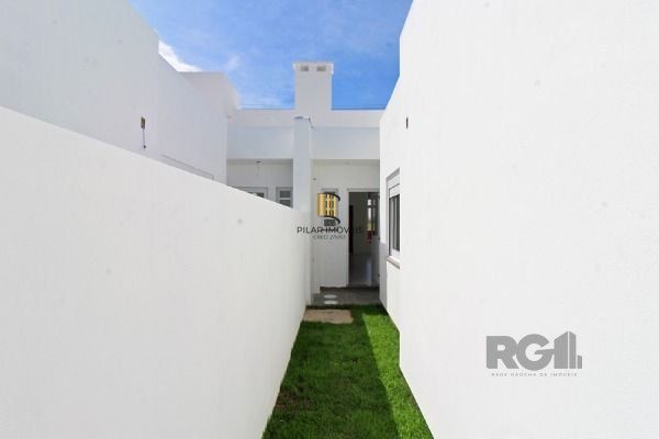 Casa Condominio em Porto Alegre, no bairro Hípica, com 3 dormitório(s), e 3 banheiros, à venda.