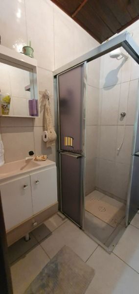 Casa em Porto Alegre, no bairro Ponta Grossa, com 3 dormitório(s), e 3 banheiros, à venda.