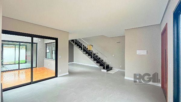 Casa Condominio em Porto Alegre, no bairro Hípica, com 3 dormitório(s), e 3 banheiros, à venda.