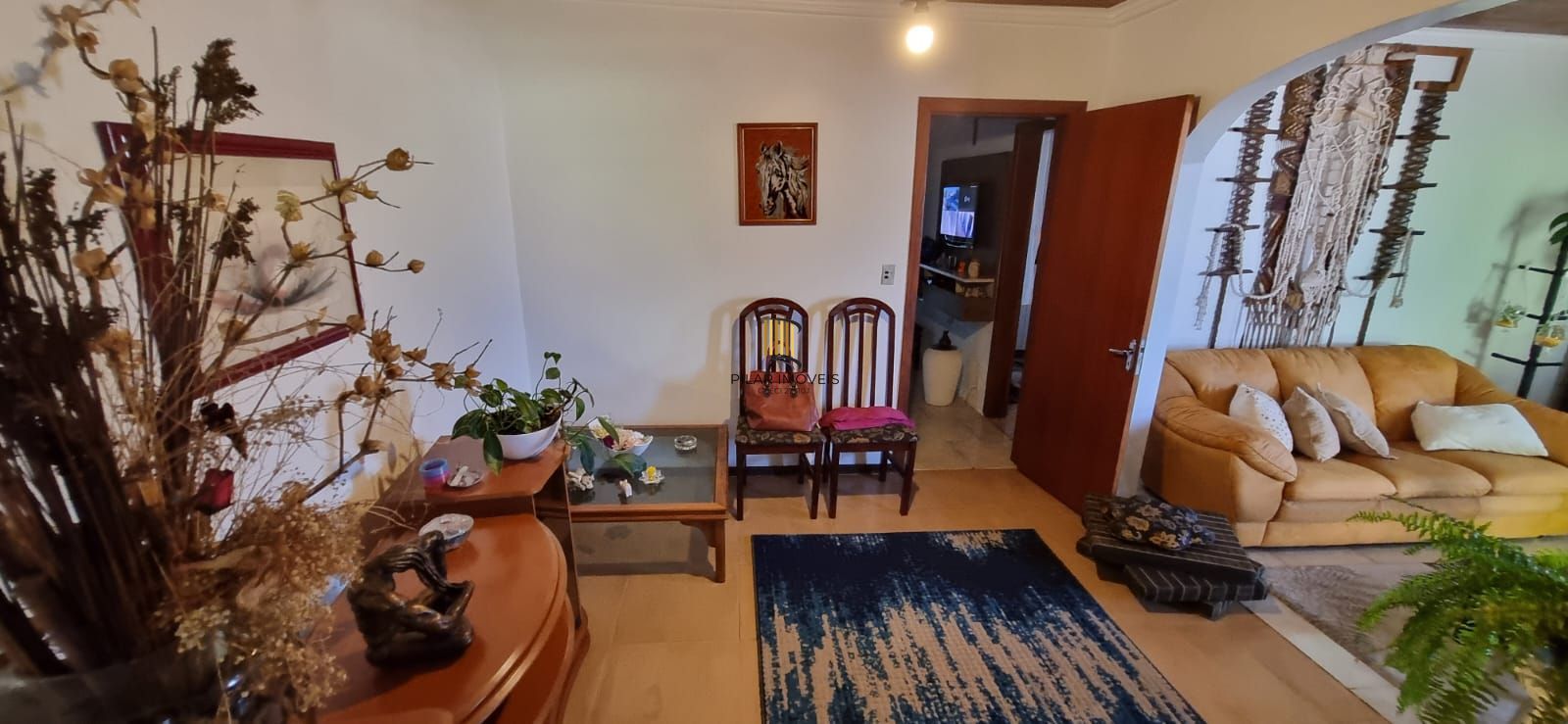 Casa com pavilhão