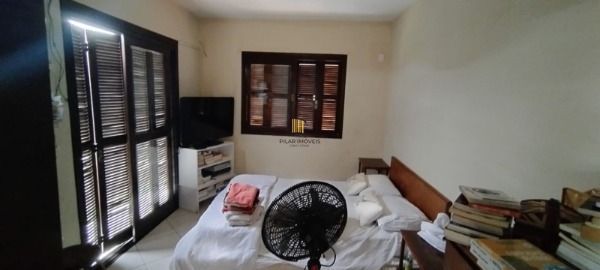 Casa 3 dormitórios no bairro Guarujá