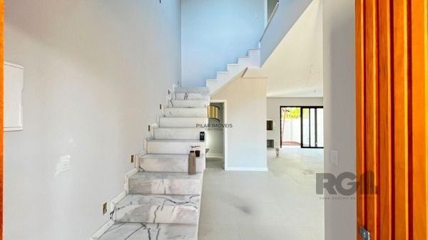 Casa Condominio em Porto Alegre, no bairro Ipanema, com 3 dormitório(s), à venda.