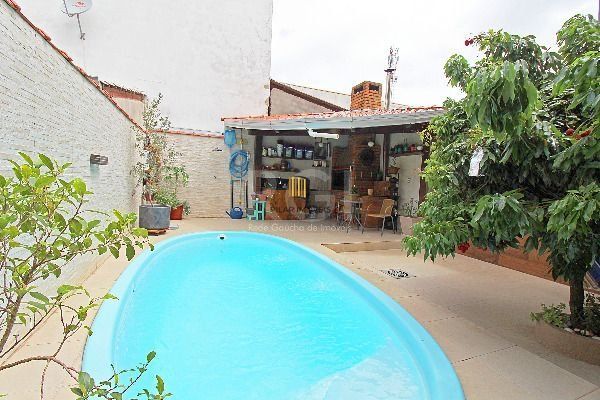 Casa em Porto Alegre, no bairro Hípica, com 3 dormitório(s), e 3 banheiros, à venda. - Pilar Imóveis