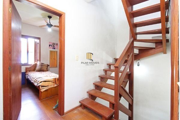 Casa em Porto Alegre, no bairro Hípica, com 2 dormitório(s), e 2 banheiros, à venda.