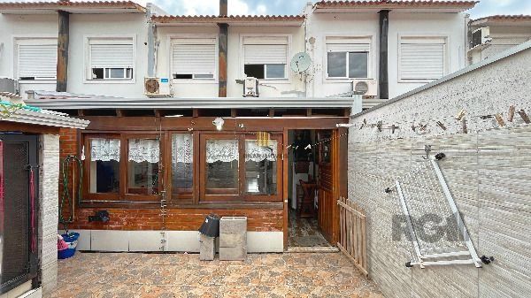 Casa Condominio em Porto Alegre, no bairro Hípica, com 3 dormitório(s), e 3 banheiros, à venda.