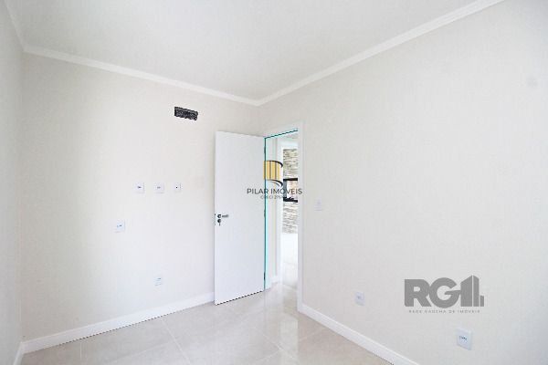 Casa Condominio em Porto Alegre, no bairro Hípica, com 3 dormitório(s), e 3 banheiros, à venda.