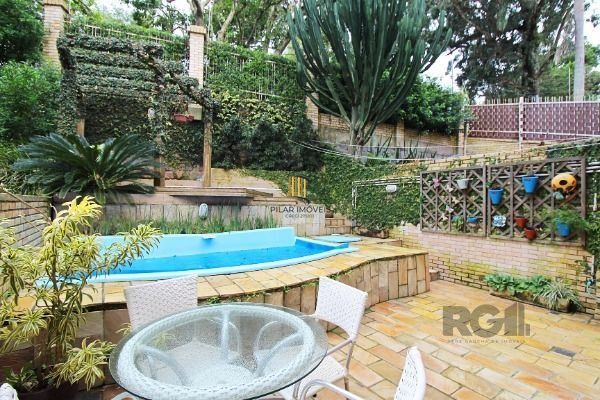 Casa Condominio em Porto Alegre, no bairro Sétimo Céu, com 4 dormitório(s), e 4 banheiros, à venda.