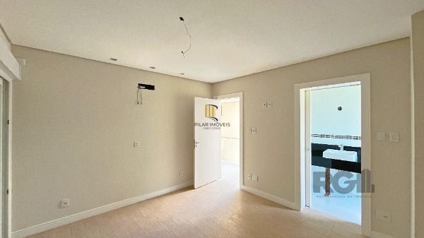 Casa Condominio em Porto Alegre, no bairro Hípica, com 3 dormitório(s), e 3 banheiros, à venda.