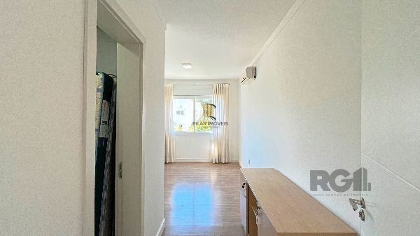 Casa Condominio em Porto Alegre, no bairro Hípica, com 3 dormitório(s), e 3 banheiros, à venda.