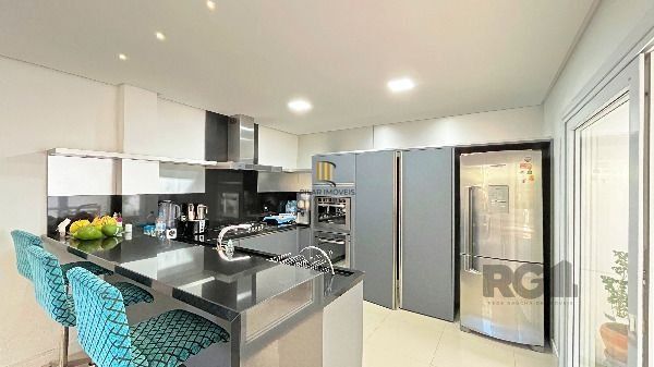Casa Condominio em Porto Alegre, no bairro Hípica, com 3 dormitório(s), e 3 banheiros, à venda.