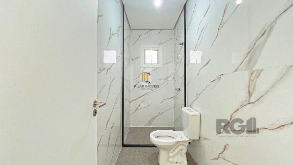 Casa Condominio em Porto Alegre, no bairro Hípica, com 3 dormitório(s), e 3 banheiros, à venda.