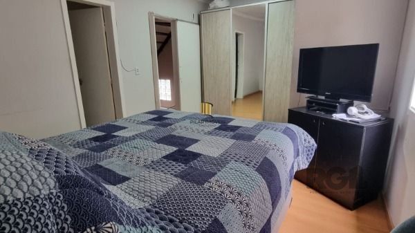 Casa Condominio em Porto Alegre, no bairro Espírito Santo, com 3 dormitório(s), e 3 banheiros, à venda.