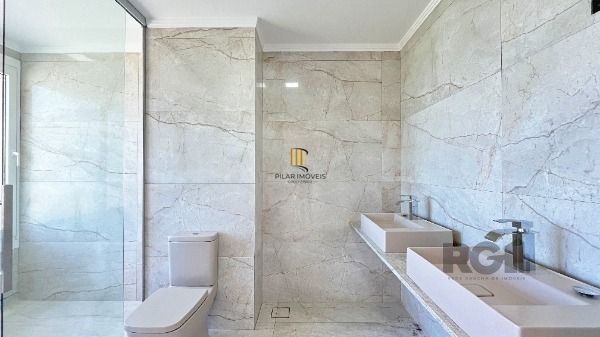 Casa Condominio em Porto Alegre, no bairro Hípica, com 3 dormitório(s), e 3 banheiros, à venda.