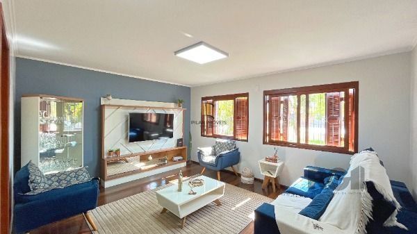 Casa 3 dormitórios no bairro Hípica