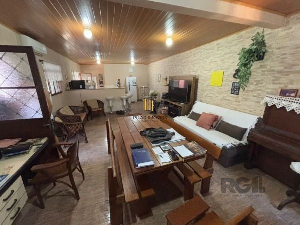 Casa 3 dormitórios no bairro Camaquã