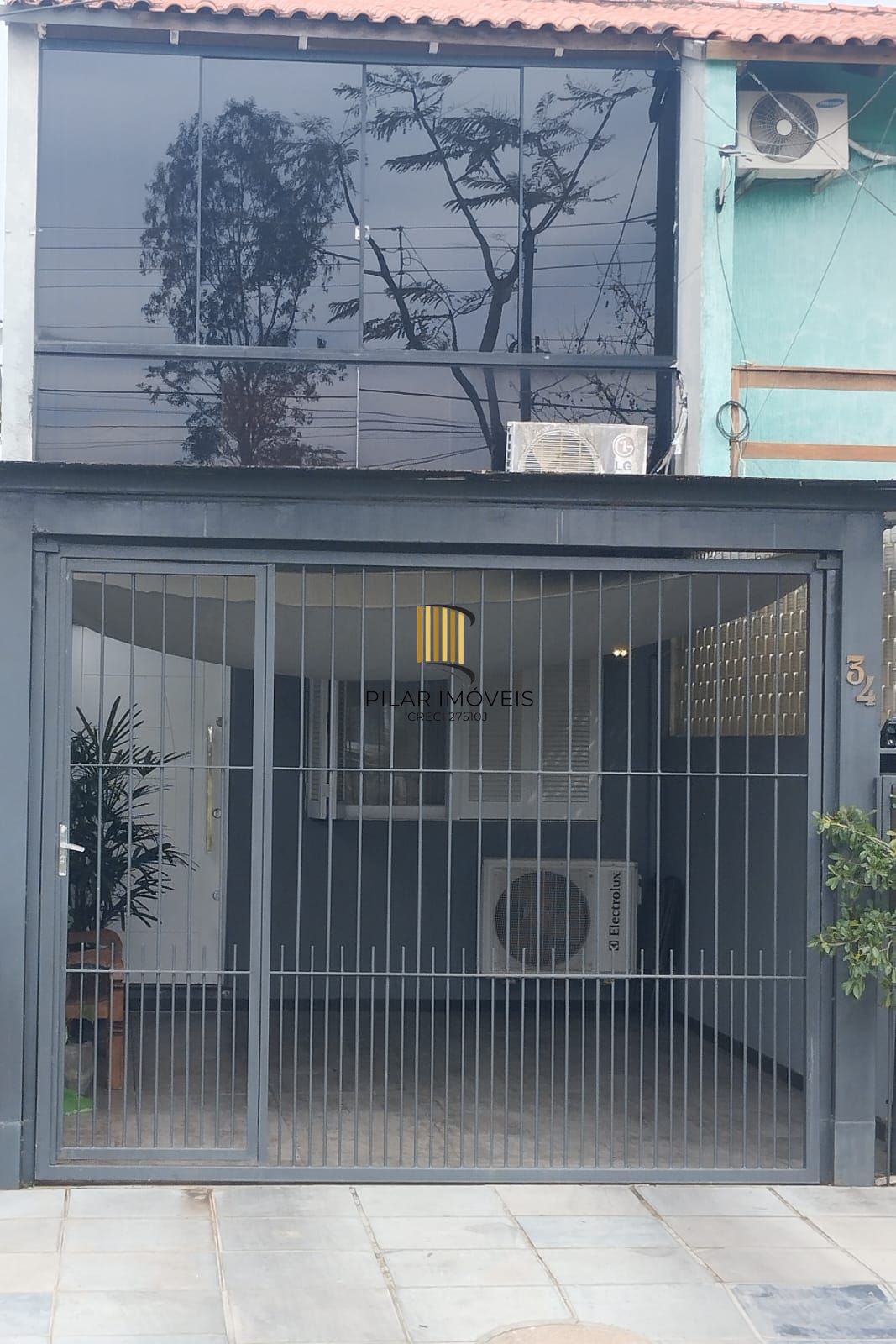 Casa na Zona sul de Porto Alegre com 02 dormitórios e pátio. - Pilar Imóveis