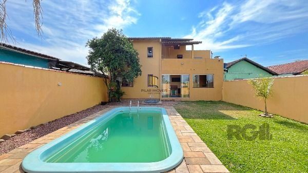 Casa 3 dormitórios no bairro Hípica