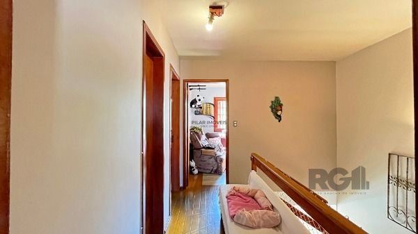 Casa Condominio em Porto Alegre, no bairro Ipanema, com 3 dormitório(s), e 3 banheiros, à venda.