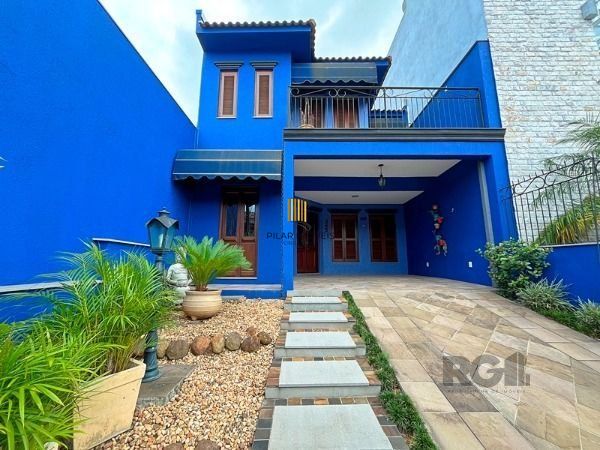 Casa em Porto Alegre, no bairro Hípica, com 3 dormitório(s), e 3 banheiros, à venda.