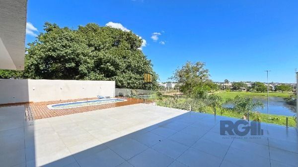 Casa Condominio em Porto Alegre, no bairro Hípica, com 3 dormitório(s), e 3 banheiros, à venda.