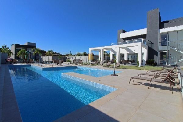 Casa Condominio em Porto Alegre, no bairro Ipanema, com 3 dormitório(s), à venda.