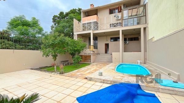 Casa 3 dormitórios no bairro Nonoai - Pilar Imóveis