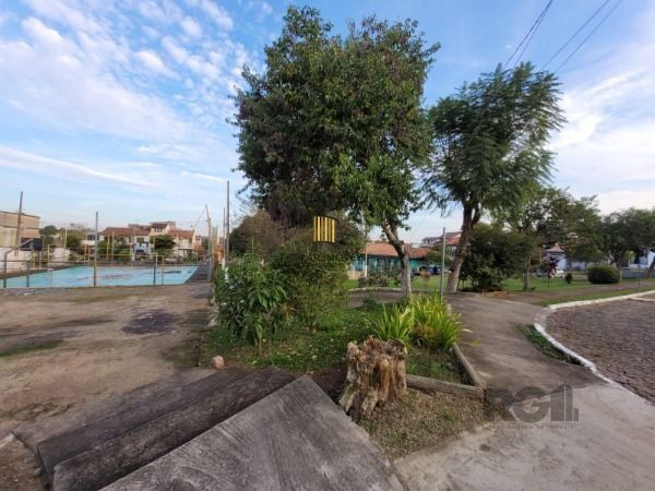 Casa Condominio em Porto Alegre, no bairro Hípica, com 3 dormitório(s), e 3 banheiros, à venda.
