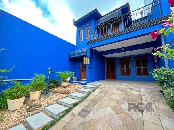 Casa em Porto Alegre, no bairro Hípica, com 3 dormitório(s), e 3 banheiros, à venda.