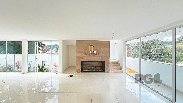 Casa Condominio em Porto Alegre, no bairro Hípica, com 3 dormitório(s), à venda.