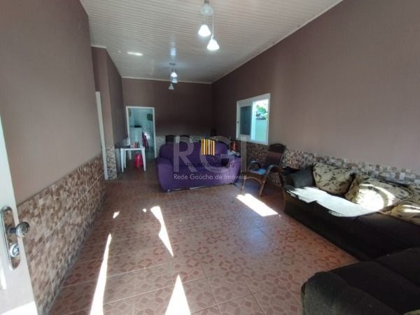 Casa em Porto Alegre, no bairro Belém Novo, com 5 dormitório(s), e 5 banheiros, à venda.