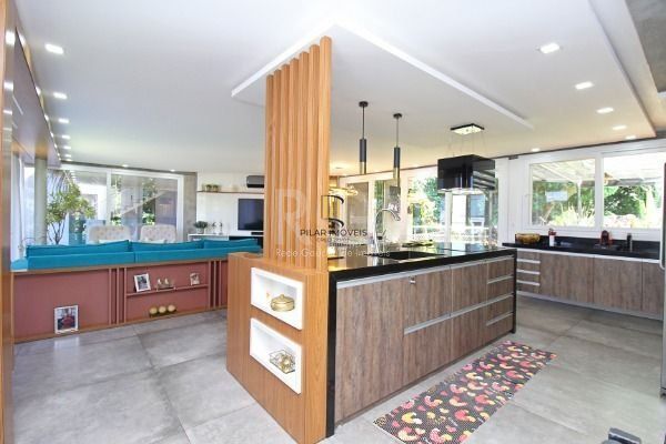 Casa Condominio em Porto Alegre, no bairro Hípica, com 3 dormitório(s), e 3 banheiros, à venda.