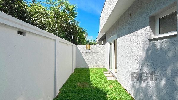 Casa Condominio em Porto Alegre, no bairro Hípica, com 3 dormitório(s), e 3 banheiros, à venda.