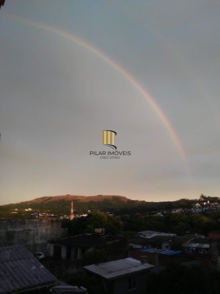 Casa 3 dormitórios no bairro Guarujá