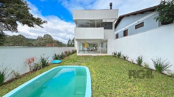 Casa Condominio em Porto Alegre, no bairro Hípica, com 3 dormitório(s), à venda.